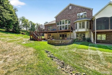 Experience luxury living in this stunning villa, perfectly on Meadowbrook Country Club in Missouri - for sale on GolfHomes.com, golf home, golf lot