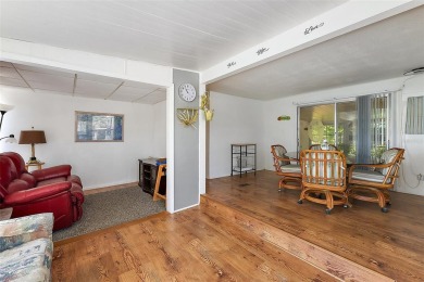 This 2-bedroom, 2-bath furnished mobile home located in the on Bay Tree Golf Course in Florida - for sale on GolfHomes.com, golf home, golf lot