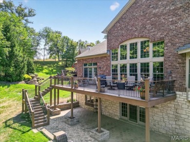 Experience luxury living in this stunning villa, perfectly on Meadowbrook Country Club in Missouri - for sale on GolfHomes.com, golf home, golf lot