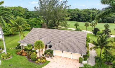 Elegant custom home on a rare oversized lot at the end of the on  in Florida - for sale on GolfHomes.com, golf home, golf lot