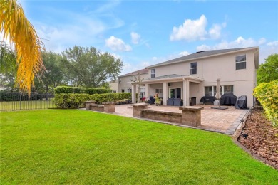 Fall in love with this stunning home nestled in the prestigious on Eagle Creek Golf Club in Florida - for sale on GolfHomes.com, golf home, golf lot