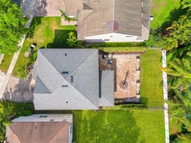 Fall in love with this stunning home nestled in the prestigious on Eagle Creek Golf Club in Florida - for sale on GolfHomes.com, golf home, golf lot