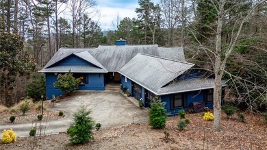 Nestled in the serene lake-community of Keowee Key in Salem on Keowee Key Golf and Country Club in South Carolina - for sale on GolfHomes.com, golf home, golf lot