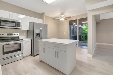 This unit is a 10!  1st floor completely upgraded unit.  Split on Boca Pointe Country Club in Florida - for sale on GolfHomes.com, golf home, golf lot
