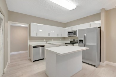 This unit is a 10!  1st floor completely upgraded unit.  Split on Boca Pointe Country Club in Florida - for sale on GolfHomes.com, golf home, golf lot
