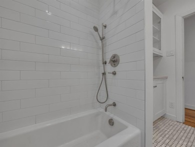 Updated 1942 traditional style home with Austin stone exterior on Stevens Park Golf Course in Texas - for sale on GolfHomes.com, golf home, golf lot