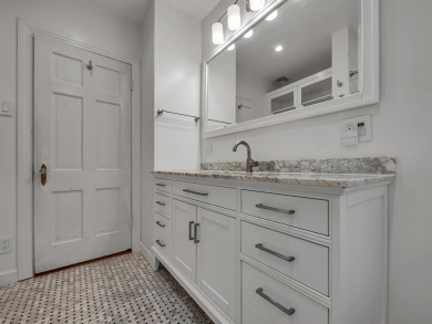 Updated 1942 traditional style home with Austin stone exterior on Stevens Park Golf Course in Texas - for sale on GolfHomes.com, golf home, golf lot