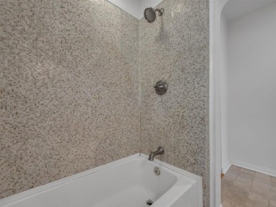 Updated 1942 traditional style home with Austin stone exterior on Stevens Park Golf Course in Texas - for sale on GolfHomes.com, golf home, golf lot