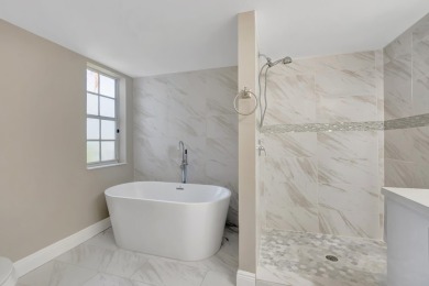 This unit is a 10!  1st floor completely upgraded unit.  Split on Boca Pointe Country Club in Florida - for sale on GolfHomes.com, golf home, golf lot