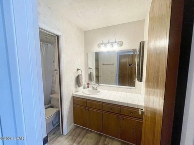 Desirable end unit at Stonebridge golf course community! on London Bridge Golf Course in Arizona - for sale on GolfHomes.com, golf home, golf lot