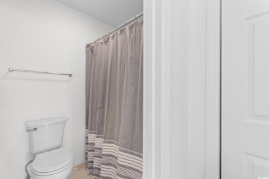 Discover your perfect coastal escape! This furnished and on Arcadian Shores Golf Club in South Carolina - for sale on GolfHomes.com, golf home, golf lot