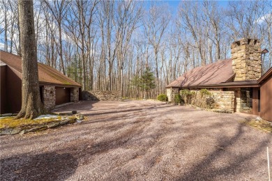 Amazing golf course views from this rustic contemporary home on Nemacolin Woodlands Resort and Spa in Pennsylvania - for sale on GolfHomes.com, golf home, golf lot