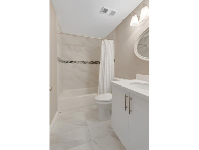 This unit is a 10!  1st floor completely upgraded unit.  Split on Boca Pointe Country Club in Florida - for sale on GolfHomes.com, golf home, golf lot