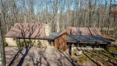 Amazing golf course views from this rustic contemporary home on Nemacolin Woodlands Resort and Spa in Pennsylvania - for sale on GolfHomes.com, golf home, golf lot