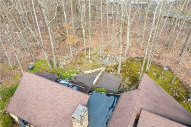 Amazing golf course views from this rustic contemporary home on Nemacolin Woodlands Resort and Spa in Pennsylvania - for sale on GolfHomes.com, golf home, golf lot