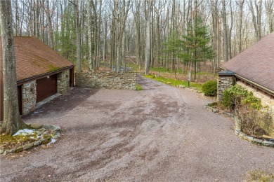 Amazing golf course views from this rustic contemporary home on Nemacolin Woodlands Resort and Spa in Pennsylvania - for sale on GolfHomes.com, golf home, golf lot