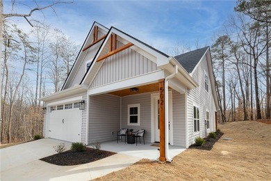 Gorgeous newly constructed contemporary design home in a Lake on The Trail At Chickasaw Pointe in South Carolina - for sale on GolfHomes.com, golf home, golf lot