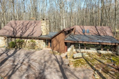 Amazing golf course views from this rustic contemporary home on Nemacolin Woodlands Resort and Spa in Pennsylvania - for sale on GolfHomes.com, golf home, golf lot