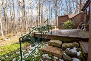 Amazing golf course views from this rustic contemporary home on Nemacolin Woodlands Resort and Spa in Pennsylvania - for sale on GolfHomes.com, golf home, golf lot