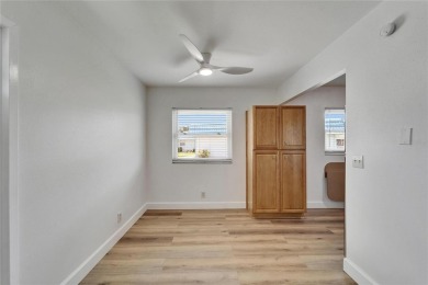 This move-in-ready gem welcomes you with beautiful luxury vinyl on Kings Point Executive Golf Course in Florida - for sale on GolfHomes.com, golf home, golf lot