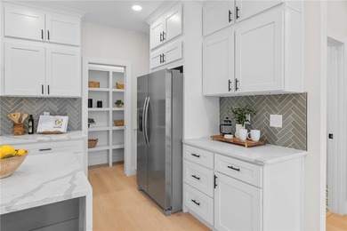 Gorgeous newly constructed contemporary design home in a Lake on The Trail At Chickasaw Pointe in South Carolina - for sale on GolfHomes.com, golf home, golf lot