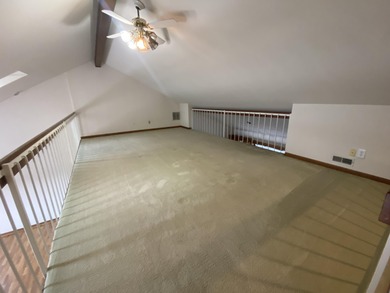 Enjoy stunning Lake views from this 3 bedroom and 2 bath condo on Lake of Four Seasons Country Club in Indiana - for sale on GolfHomes.com, golf home, golf lot