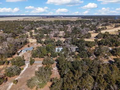 Welcome to this spacious and inviting 3/2.5 home offering almost on Chiefland Golf and Country Club in Florida - for sale on GolfHomes.com, golf home, golf lot