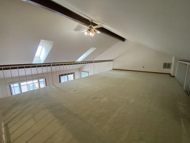 Enjoy stunning Lake views from this 3 bedroom and 2 bath condo on Lake of Four Seasons Country Club in Indiana - for sale on GolfHomes.com, golf home, golf lot