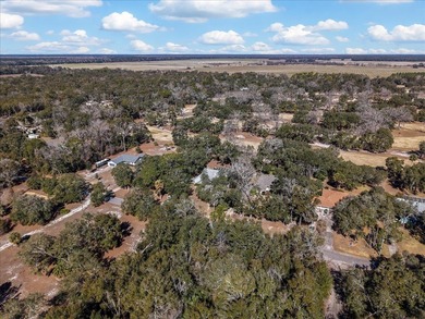 Welcome to this spacious and inviting 3/2.5 home offering almost on Chiefland Golf and Country Club in Florida - for sale on GolfHomes.com, golf home, golf lot