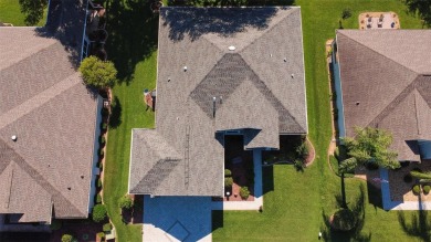 Stunning home loaded with upgrades on a deep semi-private lot on Eagle Ridge At Spruce Creek Country Club in Florida - for sale on GolfHomes.com, golf home, golf lot