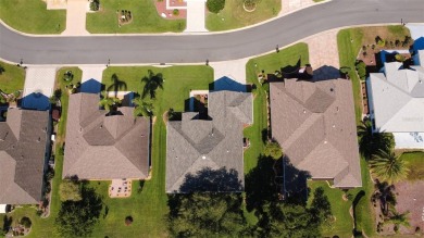 Stunning home loaded with upgrades on a deep semi-private lot on Eagle Ridge At Spruce Creek Country Club in Florida - for sale on GolfHomes.com, golf home, golf lot
