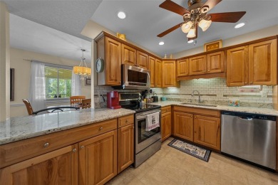 EXQUISITE Furnished Lakefront 55+ 2/2 Condo.   Back on the on Country Club At Silver Springs Shores in Florida - for sale on GolfHomes.com, golf home, golf lot