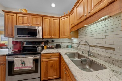 EXQUISITE Furnished Lakefront 55+ 2/2 Condo.   Back on the on Country Club At Silver Springs Shores in Florida - for sale on GolfHomes.com, golf home, golf lot