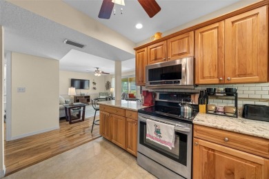 EXQUISITE Furnished Lakefront 55+ 2/2 Condo.   Back on the on Country Club At Silver Springs Shores in Florida - for sale on GolfHomes.com, golf home, golf lot