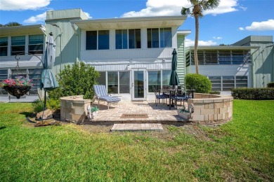 EXQUISITE Furnished Lakefront 55+ 2/2 Condo.   Back on the on Country Club At Silver Springs Shores in Florida - for sale on GolfHomes.com, golf home, golf lot