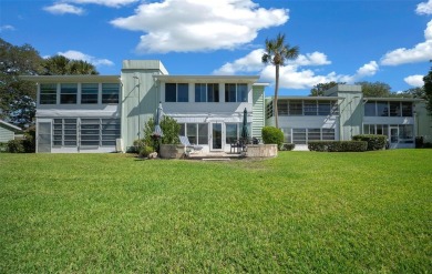 EXQUISITE Furnished Lakefront 55+ 2/2 Condo.   Back on the on Country Club At Silver Springs Shores in Florida - for sale on GolfHomes.com, golf home, golf lot