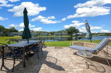 EXQUISITE Furnished Lakefront 55+ 2/2 Condo.   Back on the on Country Club At Silver Springs Shores in Florida - for sale on GolfHomes.com, golf home, golf lot