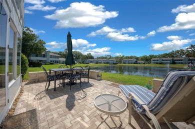EXQUISITE Furnished Lakefront 55+ 2/2 Condo.   Back on the on Country Club At Silver Springs Shores in Florida - for sale on GolfHomes.com, golf home, golf lot