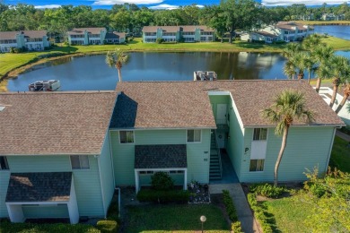 EXQUISITE Furnished Lakefront 55+ 2/2 Condo.   Back on the on Country Club At Silver Springs Shores in Florida - for sale on GolfHomes.com, golf home, golf lot