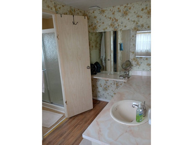 ***Your paradise on EASY ST*** Located in Rolling Greens Village on Rolling Greens Executive Golf Community in Florida - for sale on GolfHomes.com, golf home, golf lot