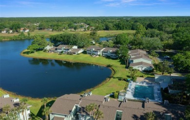 EXQUISITE Furnished Lakefront 55+ 2/2 Condo.   Back on the on Country Club At Silver Springs Shores in Florida - for sale on GolfHomes.com, golf home, golf lot