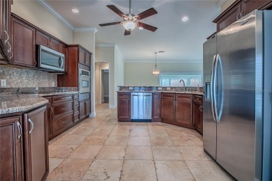 Perfect stretched Gardinia nestled at the head of a  cul-de-sac on Bella Glade Country Club in Florida - for sale on GolfHomes.com, golf home, golf lot