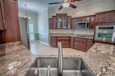 Perfect stretched Gardinia nestled at the head of a  cul-de-sac on Bella Glade Country Club in Florida - for sale on GolfHomes.com, golf home, golf lot