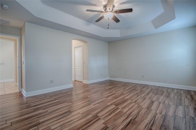 Perfect stretched Gardinia nestled at the head of a  cul-de-sac on Bella Glade Country Club in Florida - for sale on GolfHomes.com, golf home, golf lot