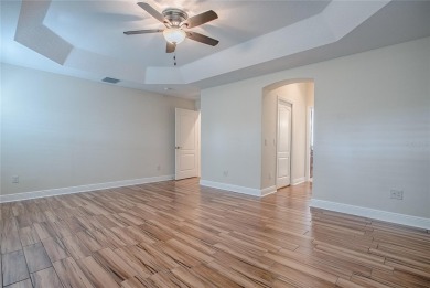 Perfect stretched Gardinia nestled at the head of a  cul-de-sac on Bella Glade Country Club in Florida - for sale on GolfHomes.com, golf home, golf lot