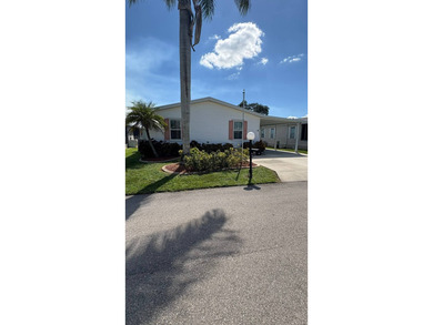 Welcome home to this beautifully maintained 3-bedroom, 2-bath on Sabal Springs Golf and Racquet Club in Florida - for sale on GolfHomes.com, golf home, golf lot