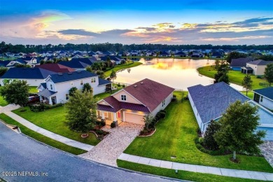 WATERFRONT LUXURY in Amelia Walk! Perfectly positioned on a on Golf Club At North Hampton in Florida - for sale on GolfHomes.com, golf home, golf lot