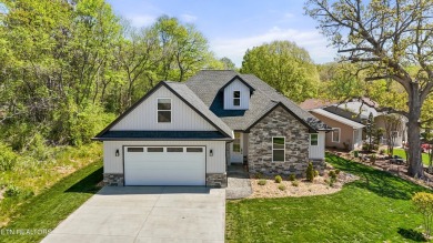 Experience comfort and style in this exceptionally maintained on Toqua Golf Course - Loudon County in Tennessee - for sale on GolfHomes.com, golf home, golf lot