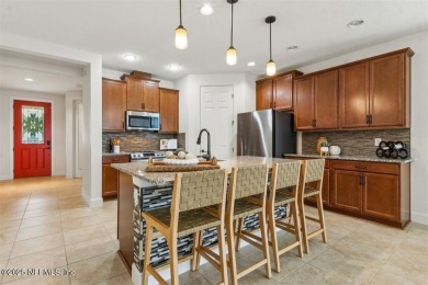 WATERFRONT LUXURY in Amelia Walk! Perfectly positioned on a on Golf Club At North Hampton in Florida - for sale on GolfHomes.com, golf home, golf lot