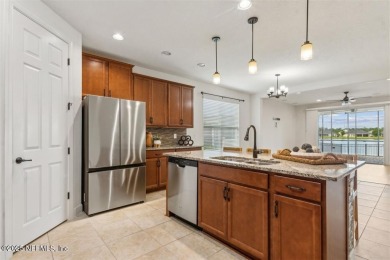 WATERFRONT LUXURY in Amelia Walk! Perfectly positioned on a on Golf Club At North Hampton in Florida - for sale on GolfHomes.com, golf home, golf lot